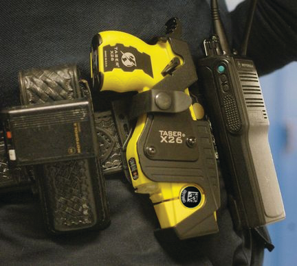 Taser On A Police Officers Bel 10895083