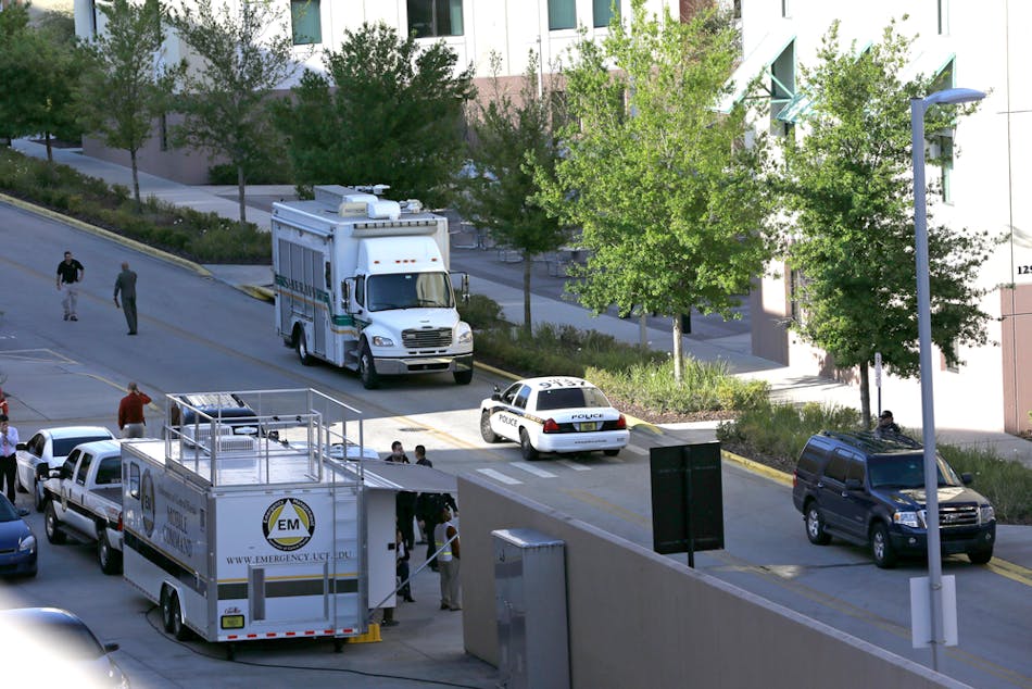 Various police agencies are seen during an investigation at the University of Central Florida on March 18 in Orlando, Fla.