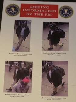 Photos of one of two suspects sought in the Boston Marathon bombing is displayed during a news conference talking about the investigation of the Boston Marathon explosions on April 18. Photos of one of two suspects sought in the Boston Marathon bombing is displayed during a news conference talking about the investigation of the Boston Marathon explosions on April 18.