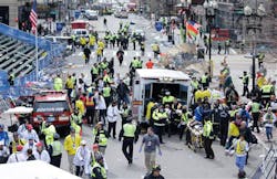 Medical workers aid injured people at the finish line of the 2013 Boston Marathon following an explosion in Boston. Medical workers aid injured people at the finish line of the 2013 Boston Marathon following an explosion in Boston.