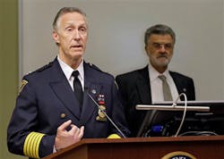 Cleveland Police Chief Mike McGrath answers questions with Mayor Frank Jackson, back, after release of a report on a Nov. 2012 police chase and shooting on April 24. Cleveland Police Chief Mike McGrath answers questions with Mayor Frank Jackson, back, after release of a report on a Nov. 2012 police chase and shooting on April 24.
