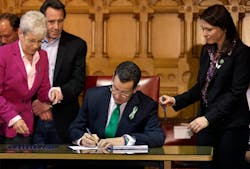 Connecticut Gov. Dannel P. Malloy, center, signs legislation at the Capitol in Hartford, Conn. on April 4. Connecticut Gov. Dannel P. Malloy, center, signs legislation at the Capitol in Hartford, Conn. on April 4.