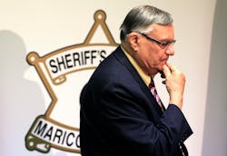 Maricopa County Sheriff Joe Arpaio pauses prior to holding a news conference.