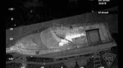 An image is seen from a Massachusetts State Police helicopter equipped with a FLIR Star SAFIRE III camera that helped locate bombing suspect Dzhokhar Tsarnaev.