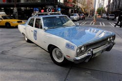 A 1970 Plymouth Satellite police cruiser is parked on a downtown Seattle street on April 23.