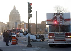 A driver fleeing police in a stolen car was injured along with a person in another vehicle in St. Paul, Minn. on April 3.