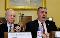 Boston Police Commissioner Edward Davis is applauded by former Sen. Joesph Lieberman, I-Conn., as he is introduced before testifying at the House Homeland Security Committee hearing on 'The Boston Bombings: A First Look,' on Capitol Hill in Washington, D.C. on May 9. Boston Police Commissioner Edward Davis is applauded by former Sen. Joesph Lieberman, I-Conn., as he is introduced before testifying at the House Homeland Security Committee hearing on 'The Boston Bombings: A First Look,' on Capitol Hill in Washington, D.C. on May 9.