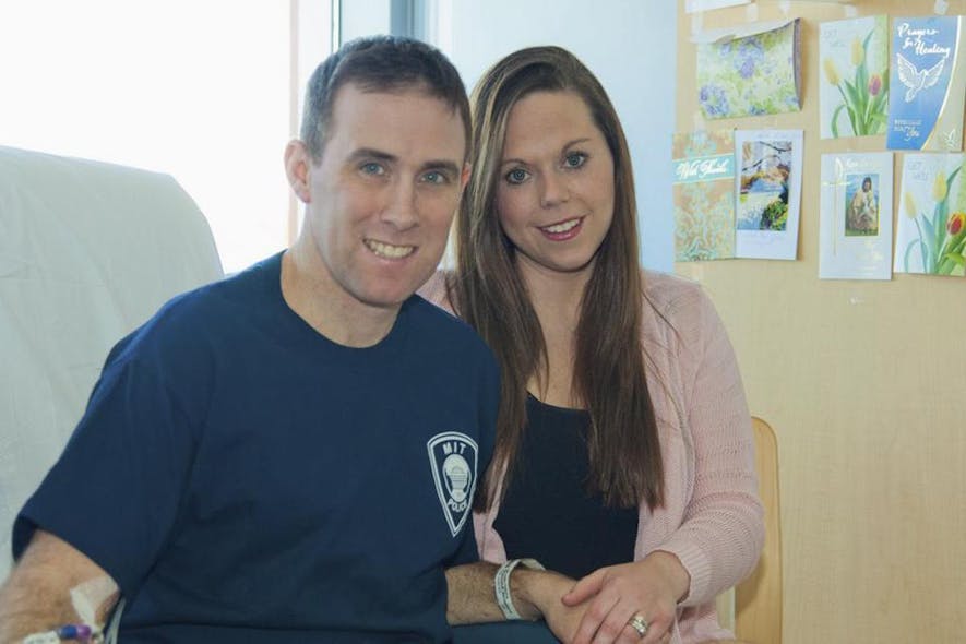 MBTA Transit Police Officer Richard Donohue is seen in the hospital with his wife, Kim.