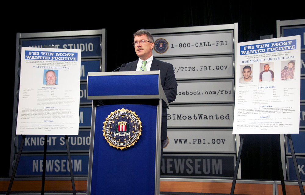 Ronald Hosko, Assistant Director of the Criminal Investigative Division, announces the new fugitives during a press conference at the Newseum in Washington, D.C. on June 17.