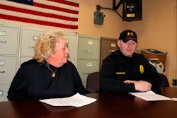 Gilberton Police Chief Mark Kessler, right, explains the purpose of his &apos;Second Amendment Preservation Resolution&apos; that was adopted at a meeting of the Gilberton Borough Council in Gliberton, Pa. last year.