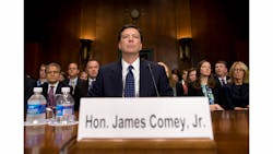 FBI Director nominee James Comey prepares to testify on Capitol Hill in Washington, D.C. on July 9. FBI Director nominee James Comey prepares to testify on Capitol Hill in Washington, D.C. on July 9.