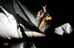 Boston Marathon bombing suspect Dzhokhar Tsarnaev, bloody and disheveled with the red dot of a sniper's rifle laser sight on his forehead, raises his hand from inside a boat at the time of his capture by law enforcement authorities in Watertown, Mass. on April 19. Boston Marathon bombing suspect Dzhokhar Tsarnaev, bloody and disheveled with the red dot of a sniper's rifle laser sight on his forehead, raises his hand from inside a boat at the time of his capture by law enforcement authorities in Watertown, Mass. on April 19.