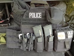 This plate carrier has an IFAK, 2 rifle mags, 2 pistol mags, 2 tourniquets and more.