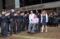 NYPD Officer Eder Loor leaves the hospital with his wife, Dina, by his side on May 2, 2012. Dina joined the police department this week after graduating from the academy. NYPD Officer Eder Loor leaves the hospital with his wife, Dina, by his side on May 2, 2012. Dina joined the police department this week after graduating from the academy.
