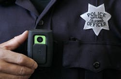 Officer Huy Nguyen shows a video camera worn by some officers in Oakland, Calif. Officer Huy Nguyen shows a video camera worn by some officers in Oakland, Calif.