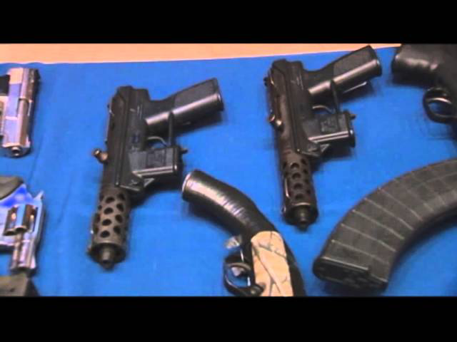 19 Charged in NYC's LargestEver Gun Bust Officer
