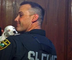 Spokane County Deputy Marc Melville said he couldn&apos;t resist the puppy&apos;s charms and took him home.