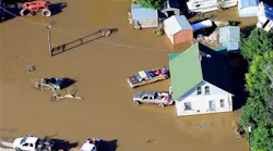 Victims of last week's devastating floods retrieve belongings outside a home near the East Platte River east of Greeley, Colo. on Sept. 17.