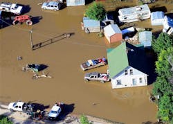 Victims of last week's devastating floods retrieve belongings outside a home near the East Platte River east of Greeley, Colo. on Sept. 17. Victims of last week's devastating floods retrieve belongings outside a home near the East Platte River east of Greeley, Colo. on Sept. 17.