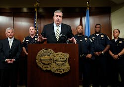 Boston Police Commissioner Edward Davis speaks during a news conference on Sept. 23 as he announces that he is stepping down after seven years on the job.