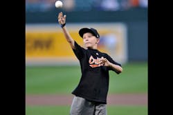Brandon Schneider throws out the ceremonial first pitch before the Baltimore Orioles and Chicago White Sox baseball game on Sept. 5 in Baltimore, Md.