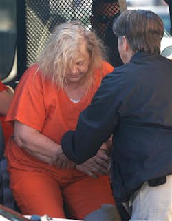 Sandy Hatte, left, is helped out of van outside the Livingston County Court House in Chillicothe, Mo. on Sept. 25. Sandy Hatte, left, is helped out of van outside the Livingston County Court House in Chillicothe, Mo. on Sept. 25.