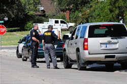 Weatherford Police direct cars away from schools as they tell parents the schools were on lock down on Sept. 24 in Weatherford, Okla. Weatherford Police direct cars away from schools as they tell parents the schools were on lock down on Sept. 24 in Weatherford, Okla.