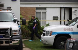 Chicago police continue their investigation at a home where a body was found buried in the backyard in the south west of Chicago on Oct. 5. Chicago police continue their investigation at a home where a body was found buried in the backyard in the south west of Chicago on Oct. 5.