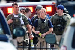 Police officers who responded to the deadly Navy Yard shooting on Sept. 16 in Washington, D.C. leave the facility. Police officers who responded to the deadly Navy Yard shooting on Sept. 16 in Washington, D.C. leave the facility.