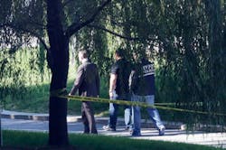 Crime scene investigators walk along a path in New York's Riverside Park South where a man earlier went on a rampage stabbing five people, including a toddler on Oct. 1. Crime scene investigators walk along a path in New York's Riverside Park South where a man earlier went on a rampage stabbing five people, including a toddler on Oct. 1.