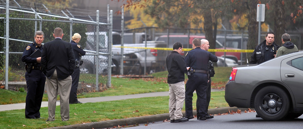 Officials work at the scene near the Jackson County District Attorney's office after an explosion shattered windows and damaged the buildings interior in Medford, Ore.on Nov. 13.