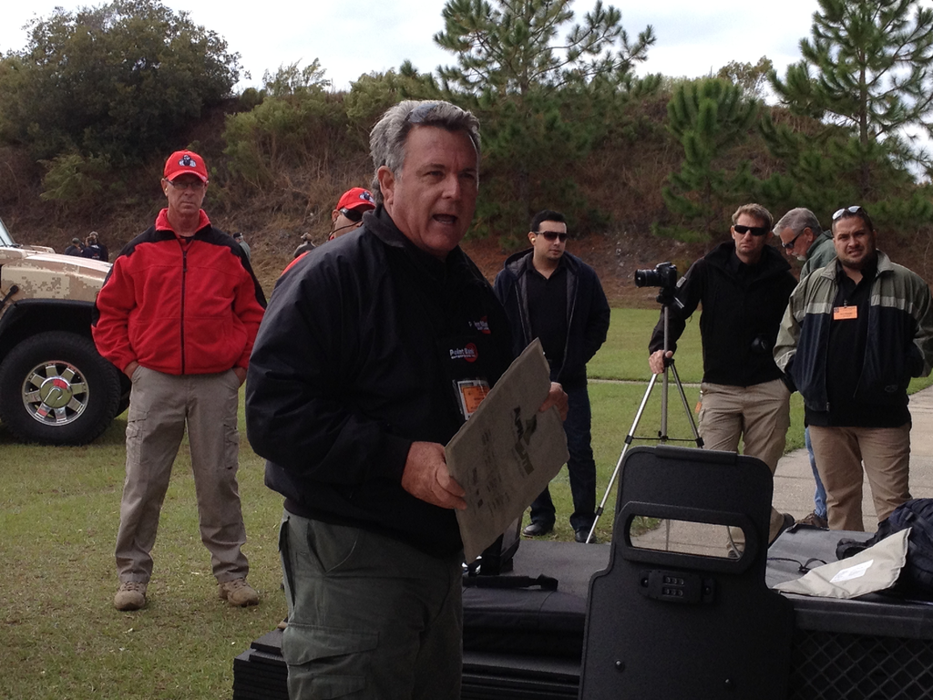 Michael Foreman, Vice President of Point Blank Enterprises, is seen holding an Alpha Elite Series ballistic vest during SWAT Round-Up in Orlando on Nov. 13.