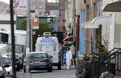 Crime scene personnel work at a crime scene in the Brooklyn section of New York on Nov. 11. Crime scene personnel work at a crime scene in the Brooklyn section of New York on Nov. 11.