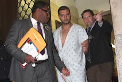 Hayden Holder is seen in custody Sunday after being arrested in the near-fatal beating of NYPD Sgt. Mohammed Deen.