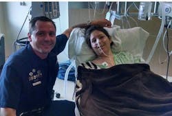 Denver Police Officer Dwayne Huddleston is shown with Alexis Davis at the hospital.