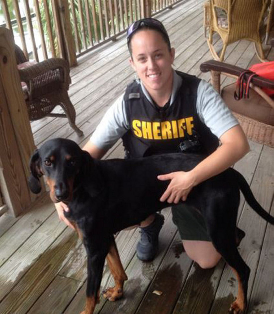 Manatee County Deputy LeAna Cudzilo is seen with Fern