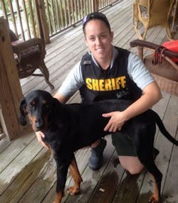 Manatee County Deputy LeAna Cudzilo is seen with Fern Manatee County Deputy LeAna Cudzilo is seen with Fern