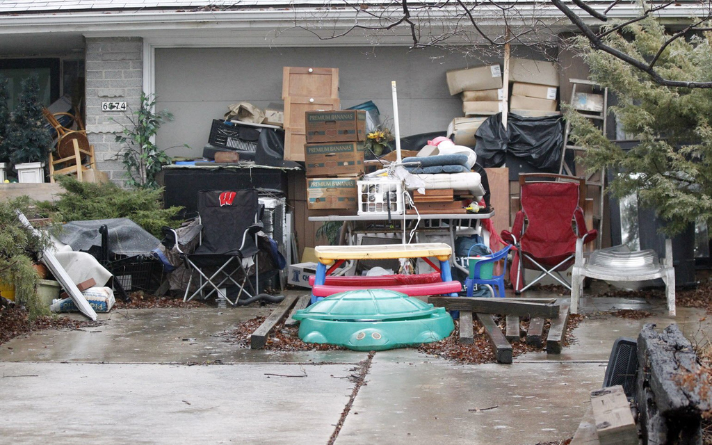 The exterior of the home of Peter M. Holzberger is seen in Glendale, Wisconsin, on Wednesday, December 4, 2013. Police say Holzberger was killed in his home by Robert Michael Christophel, 28, and Nicholas Paul Retzlaff, 25, who strangled Holzberger on Nov. 5 in Holzberger's home, according to a criminal complaint.