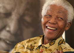 Nelson Mandela is seen in a jovial mood at the Mandela Foundation in Johannesburg in 2005. The former South African President died at age 95 on Dec. 5.