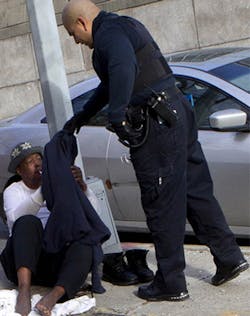 NYPD Officer Carlos Ramos literally gives a cold homeless man the sweatshirt off his back. NYPD Officer Carlos Ramos literally gives a cold homeless man the sweatshirt off his back.