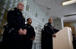 Bay Area Rapid Transit Police Chief Kenton Rainey, at podium, answers questions about the shooting of a BART officer who was killed by a fellow officer during a news conference on Jan. 22 in Oakland, Calif. Bay Area Rapid Transit Police Chief Kenton Rainey, at podium, answers questions about the shooting of a BART officer who was killed by a fellow officer during a news conference on Jan. 22 in Oakland, Calif.