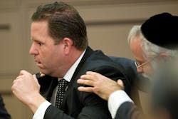 Former Fullerton police Officer Jay Cicinelli reacts after being acquitted on Jan. 13 in Santa Ana, Calif.