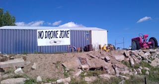 Deer Tail, Colo., Mayor Frank Fields&apos; anti-drone message could be seen from Interstate 70 before it was stolen.