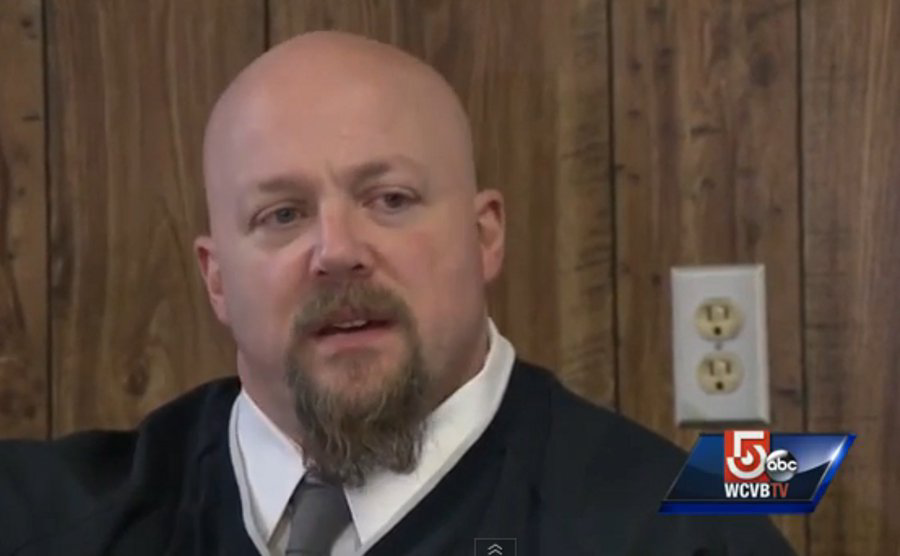 Lawrence Police Officer Carl Farrington carried a man out of a smoky building Monday night.