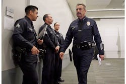 Los Angeles Police Chief Charlie Beck, right, leaves a news conference at LAPD headquarters on Feb. 4. Los Angeles Police Chief Charlie Beck, right, leaves a news conference at LAPD headquarters on Feb. 4.