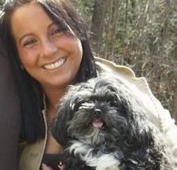 Nicole Dale is seen with her dog, Mit, that was saved by Farmington police officer after it began choking on a dental bone. Nicole Dale is seen with her dog, Mit, that was saved by Farmington police officer after it began choking on a dental bone.