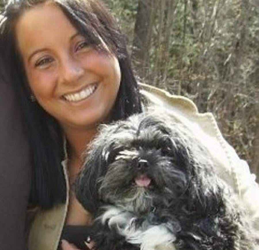 Nicole Dale is seen with her dog, Mit, that was saved by Farmington police officer after it began choking on a dental bone.