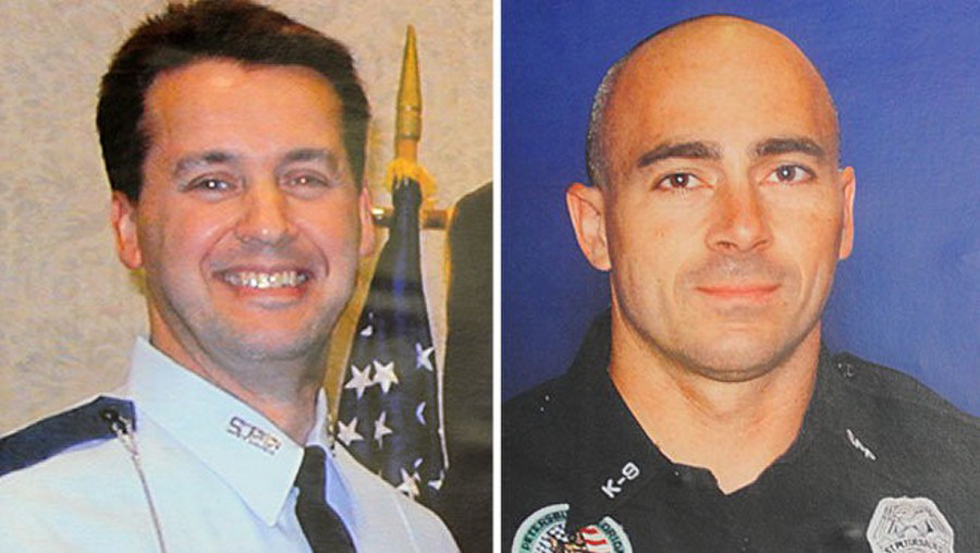 Sgt. Thomas Baitinger, left, and K-9 Officer Jeffrey Yaslowitz