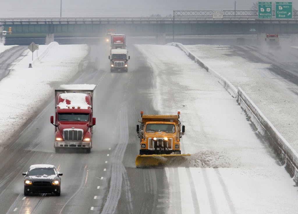 GDOT begins to clear the inner lanes of I75 in Marietta, Ga. on Feb. 13.