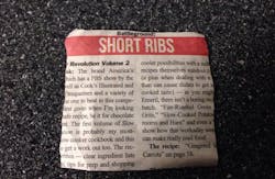 A newspaper clipping describing a recipe for short ribs landed a man in jail after he pasted the square piece of paper onto his windshield and tried to pass it off as an inspection sticker. A newspaper clipping describing a recipe for short ribs landed a man in jail after he pasted the square piece of paper onto his windshield and tried to pass it off as an inspection sticker.